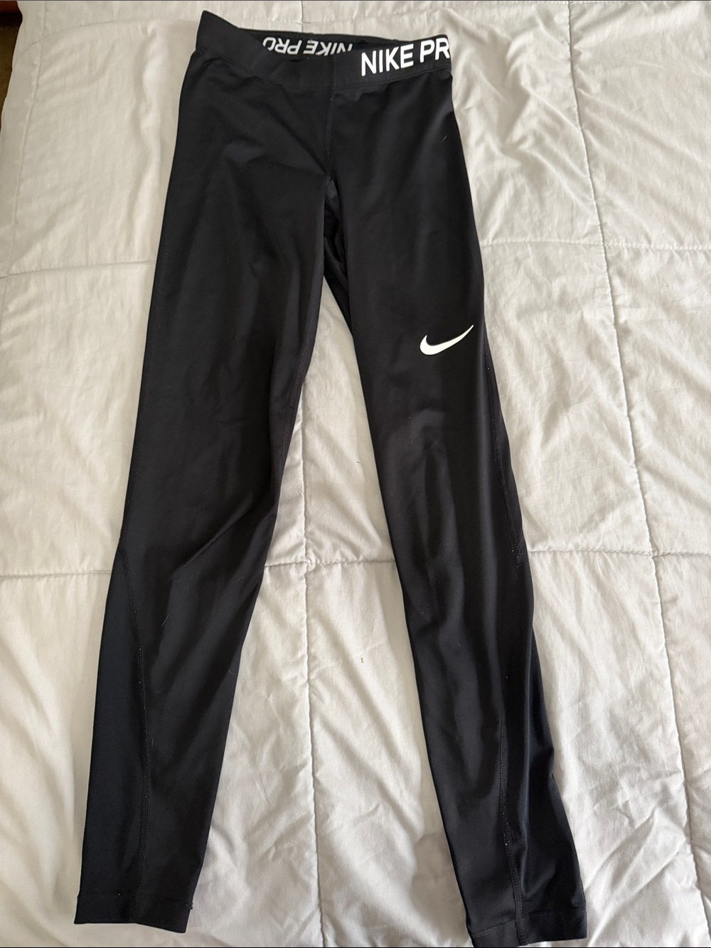 Nike Kids Black Athletic Compression Leggings with White Swoosh